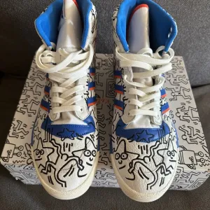 Adidas Blue and White High-Top Athletic Shoes