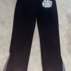 Black Pants with Graphic Pocket