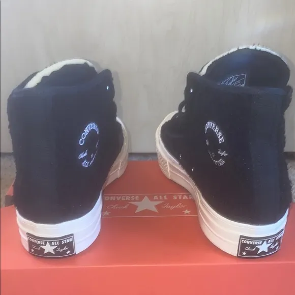 Converse Black and White High-Top Athletic Shoes