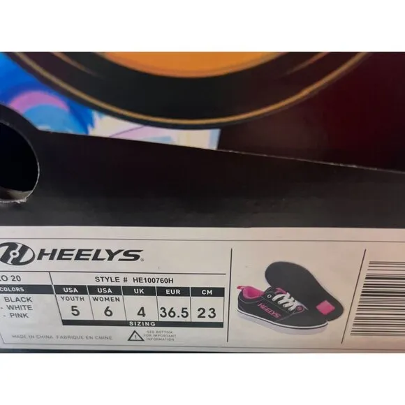 Heelys Youth size 5/ Women size‎ 6 Black &amp; Pink Skate Shoes With Wheels