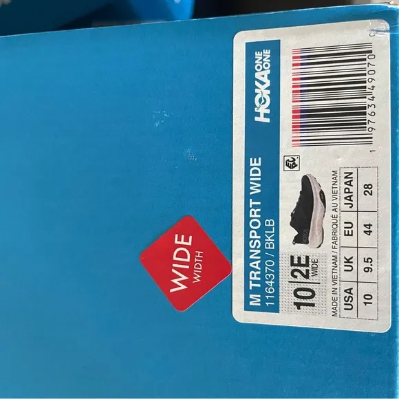 Hoka Black and White Athletic Shoes with Performance Cushioning