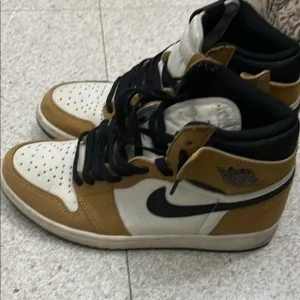 Jordan Black and Tan High-Top Athletic Sneakers