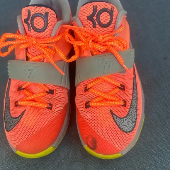 KD 7 35,000. Nike Kids' Orange and Gray Athletic Shoes