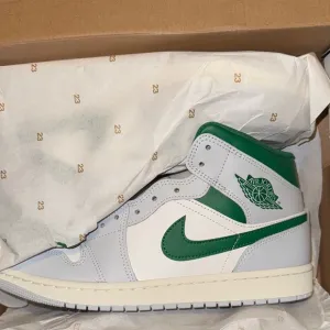 Nike Air Jordan High-Top Green and White Athletic Shoes