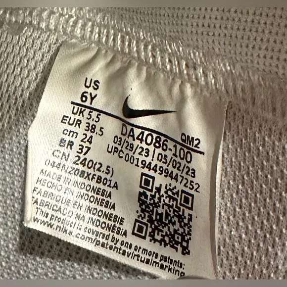 Nike big kid White and Black High-Top Sneakers