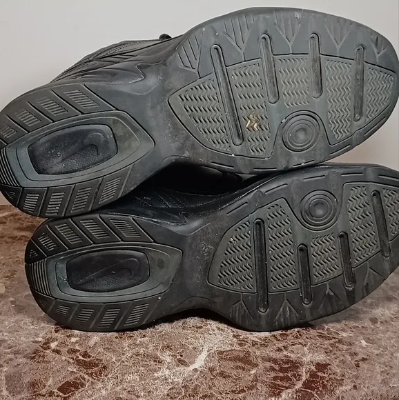 Nike Black Athletic Shoes with Rugged Design