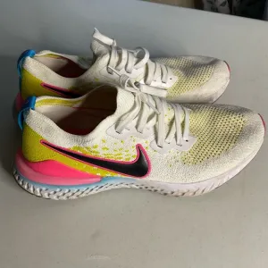 Nike Epic React Flyknit White and Pink Running Shoes