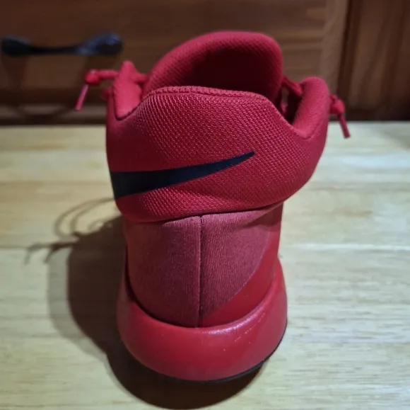 Nike Kevin Durant KD Trey V5  Red Basketball Shoes in a youth size 7.