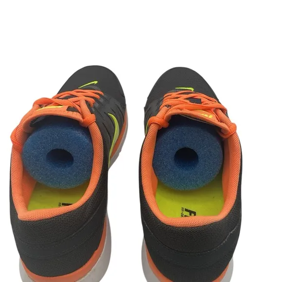 Nike running woman’s 616694-005 Black and Orange Athletic Shoes size 8.5 fitsole