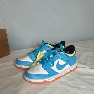 NWOT Nike Dunk Low SE Kyrie Irving Blue and White Sneakers