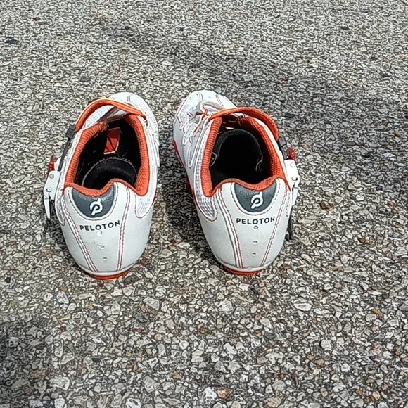 Peloton orange and white bike shoes