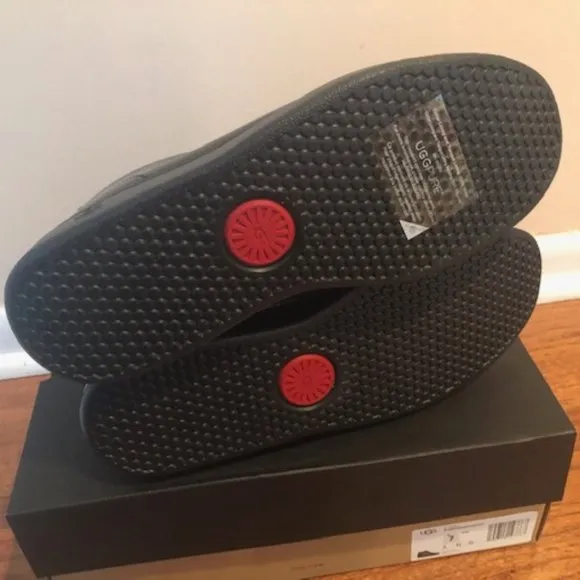 UGG Pismo black leather sneaker. Size: 9, 10