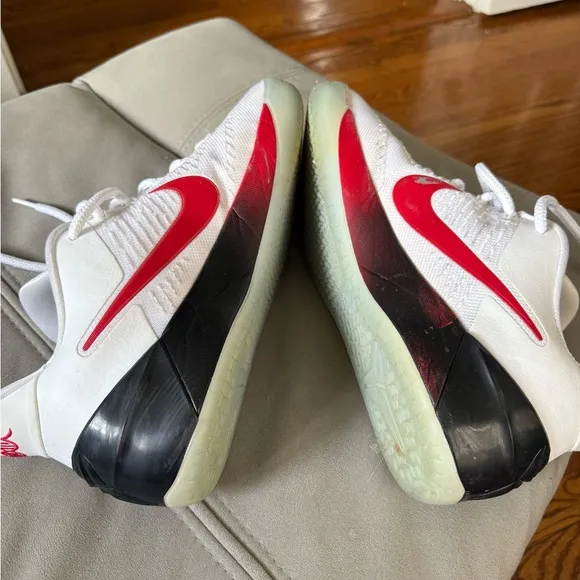 White and Red Athletic Shoes with Sleek Design