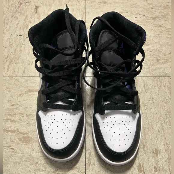 White, black and purple high top shoes